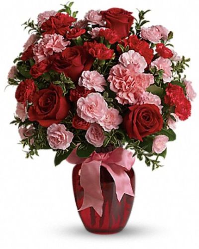 <div class="m-pdp-tabs-description">
<div id="mark-2" class="m-pdp-tabs-marketing-description">True romance will bloom brighter than ever when you surprise her with this dazzling bouquet of red roses, red carnations and other favorites in a chic ruby red vase. "Surprise" is the key word. That's when flowers mean the most.</div>
</div>
This gorgeous bouquet includes red roses, red carnations, light pink carnations, red miniature carnations, light pink miniature carnations and green rhamnus accented with assorted greenery and a pink satin ribbon.
<ul>
<li>Our florists hand-design each arrangement, so colors, varieties and container may vary due to local availability</li>
</ul>