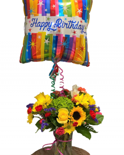 Send cheer and best wishes with the Bright & Beautiful Birthday Arrangement. Bold colors, the freshest blooms and a joyful balloon combine to create a festive feel for their special day. Handpicked happiness delivered.
<ul>
<li>Our florists hand-design each arrangement, so colors, varieties and containers may vary due to local availability</li>
</ul>