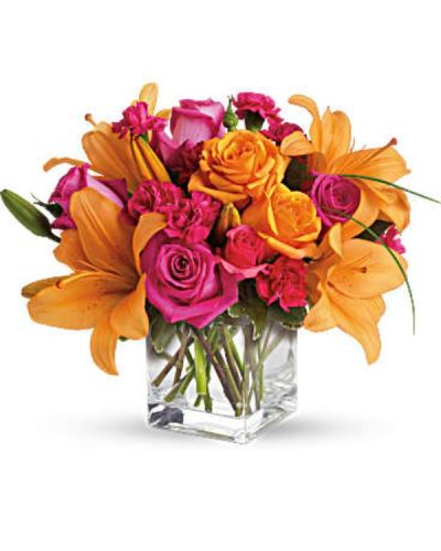 <div id="mark-3" class="m-pdp-tabs-marketing-description">Tres chic! Send that special someone a stylish sentiment with the bright colors of this modern arrangement. Summery hot pinks and oranges are contrasted by the cool clarity of a simple cube vase. An eye-catching everyday choice!</div>
<div id="desc-3">
<ul>
<li>Orange asiatic lilies, hot pink and light orange roses, miniature red carnations and a bit of understated greenery.</li>
<li>Our florists hand-design each arrangement, so colors, varieties and containers may vary due to local availability</li>
</ul>
</div>
