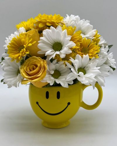 Whatever the occasion may be, send them this little bundle of floral happiness and let them know that you're thinking of them,wishing them happiness, love and joy!
<ul>
<li>Our florists hand-design each arrangement, so colors, varieties and containers may vary due to local availability</li>
</ul>