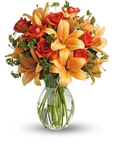 <div id="mark-3" class="m-pdp-tabs-marketing-description">Ignite their heart with this inspirational gift of warm orange roses and lilies. As wondrous as a summer sunset - but quite a bit more fragrant! - it's a versatile choice for men and women alike.</div>
<div id="desc-3">
<ul>
<li>Dark orange roses and asiatic lilies are mixed with fresh green bupleurum and variegated pittosporum.</li>
<li>Our florists hand-design each arrangement, so colors, varieties and containers may vary due to local availability</li>
</ul>
</div>