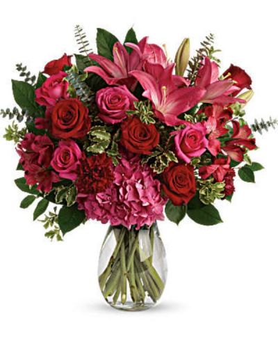 <div class="m-pdp-tabs-description">
<div id="mark-2" class="m-pdp-tabs-marketing-description">A luxurious bouquet that's sure to leave your special someone absolutely love struck! There's no denying the dramatic beauty of these radiant, red hot roses, hydrangea and lilies.</div>
</div>
This luxe arrangement includes pink hydrangea, hot pink roses, red roses, dark pink asiatic lilies, dark pink alstroemeria, maroon carnations, pitta negra, spiral eucalyptus, and lemon leaf.
<ul>
<li>Our florists hand-design each arrangement, so colors, varieties and container may vary due to local availability</li>
</ul>