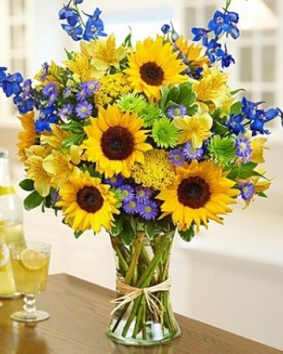 <div class="summary entry-summary">
<div class="woocommerce-product-details__short-description">
Send some sunshine with this bouquet full of fresh sunflowers, delphinium, alstroemeria, yarrow, monte casino and more!
<ul>
<li>Our florists hand-design each arrangement, so colors, varieties and containers may vary due to local availability</li>
</ul>
</div>
</div>