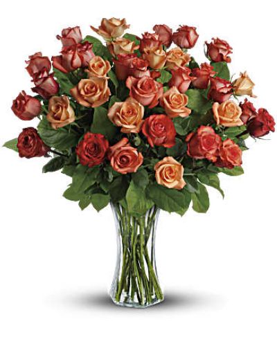 <div id="mark-2" class="m-pdp-tabs-marketing-description">The sun will come out tomorrow, and tomorrow, and tomorrow with this blazing bouquet of orange roses. Orange, light orange and dark orange - gorgeous roses delivered in a sparkling flared glass vase. No doubt about it, this is one hot gift.</div>
This spectacular bouquet includes orange roses, light orange roses and dark oranges accented with salal.
<div id="desc-2">
<ul>
<li>Our florists hand-design each arrangement, so colors, varieties and containers may vary due to local availability</li>
</ul>
</div>