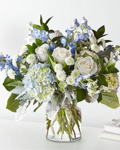 Let this uplifting arrangement be reminders of the clear skies ahead. Capturing the feeling of hope that a new day brings, this bouquet is composed of voluminous hydrangea blooms and vibrant belladonna delphinium to refresh their mood.
<ul>
<li>Our florists hand-design each arrangement, so colors, varieties and container may vary due to local availability</li>
<li></li>
</ul>