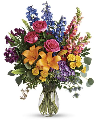 <div id="mark-3" class="m-pdp-tabs-marketing-description">A rainbow of beauty for any occasion. Purple hydrangea, pink roses and orange lilies positively pop in this bright bouquet, featuring all the colors of the rainbow.</div>
<div id="desc-3">
<ul>
<li>This colorful bouquet includes purple hydrangea, pink roses, yellow spray roses, orange asiatic lilies, purple alstroemeria, blue delphinium, pink snapdragons, blue eryngium, huckleberry, oregonia, Israeli ruscus, sword fern, silver dollar eucalyptus, seeded eucalyptus, and lemon leaf.</li>
<li>Our florists hand-design each arrangement, so colors, varieties and containers may vary due to local availability</li>
</ul>
</div>
