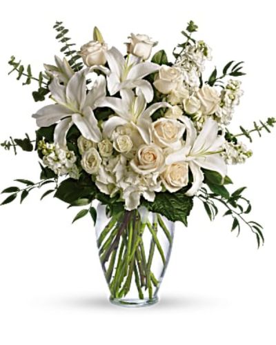 <div id="mark-3" class="m-pdp-tabs-marketing-description">A dreamy bouquet of white sympathy flowers is a comforting reminder of your love. The lush arrangement of soft colors is delivered in a majestic, tall glass vase.</div>
<div id="desc-3">
<ul>
<li>This gorgeous bouquet overflows with white hydrangea, crème roses, white spray roses, white oriental lilies, white stock, spiral eucalyptus, salal and Italian ruscus in a classic glass vase.</li>
<li>Our florists hand-design each arrangement, so colors, varieties and containers may vary due to local availability</li>
</ul>
</div>