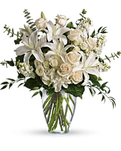 <div id="mark-3" class="m-pdp-tabs-marketing-description">A dreamy bouquet of white sympathy flowers is a comforting reminder of your love. The lush arrangement of soft colors is delivered in a majestic, tall glass vase.</div>
<div id="desc-3">
<ul>
<li>This gorgeous bouquet overflows with white hydrangea, crème roses, white spray roses, white oriental lilies, white stock, spiral eucalyptus, salal and Italian ruscus in a classic glass vase.</li>
<li>Our florists hand-design each arrangement, so colors, varieties and containers may vary due to local availability</li>
</ul>
</div>