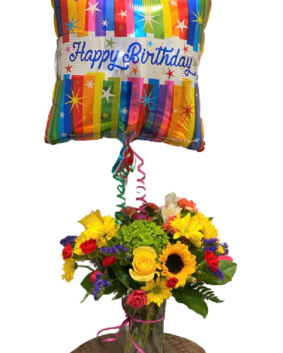 Send cheer and best wishes with the Bright & Beautiful Birthday Arrangement. Bold colors, the freshest blooms and a joyful balloon combine to create a festive feel for their special day. Handpicked happiness delivered.
<ul>
<li>Our florists hand-design each arrangement, so colors, varieties and containers may vary due to local availability</li>
</ul>