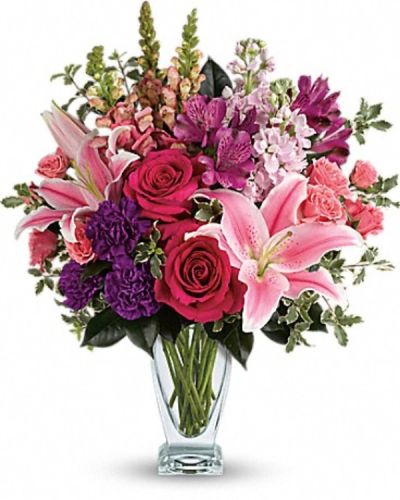<div class="m-pdp-tabs-description">
<div id="mark-3" class="m-pdp-tabs-marketing-description">Hand-delivered in a shapely glass vase, this sumptuous arrangement of roses and lilies is a lavish way to celebrate a special day - or surprise someone just because!</div>
</div>
Hot pink roses, pink spray roses, pink oriental lilies, purple alstroemeria, purple carnations, light pink stock and pink snapdragons are arranged with pitta negra and camellia leaves.
<ul>
<li>Our florists hand-design each arrangement, so colors, varieties and containers may vary due to local availability</li>
</ul>